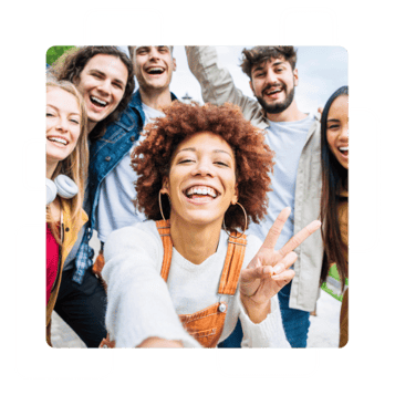 influencer posing with community of fans for selfie