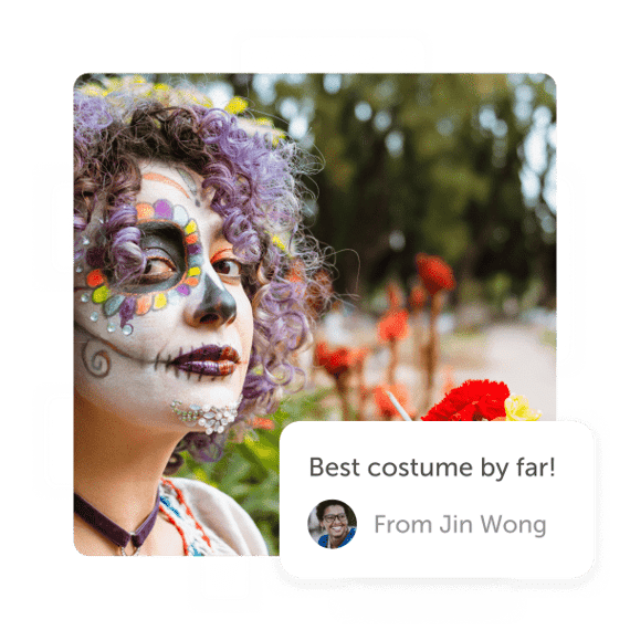 Woman with skull makeup and a "best costume" post