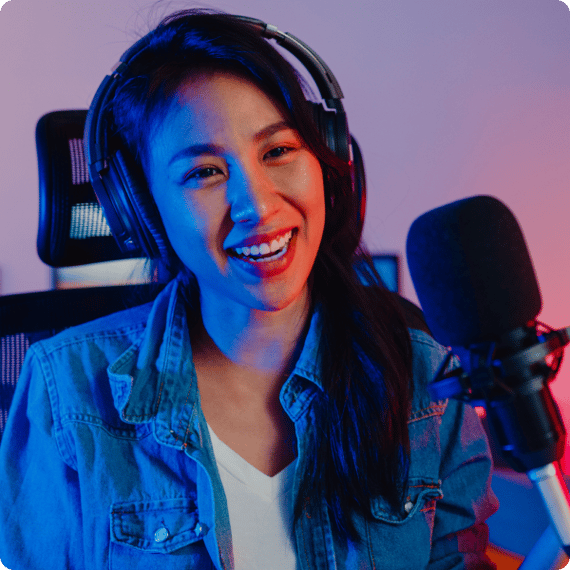 Podcaster talking into a mic