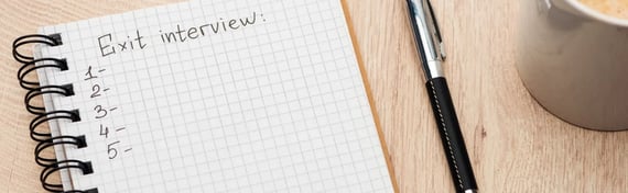 An employee struggles to create a list of effective exit interview questions, leaving the numbered list blank.