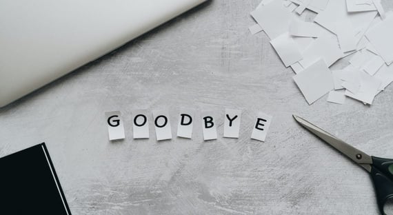 Cut out paper letters spelling goodbye