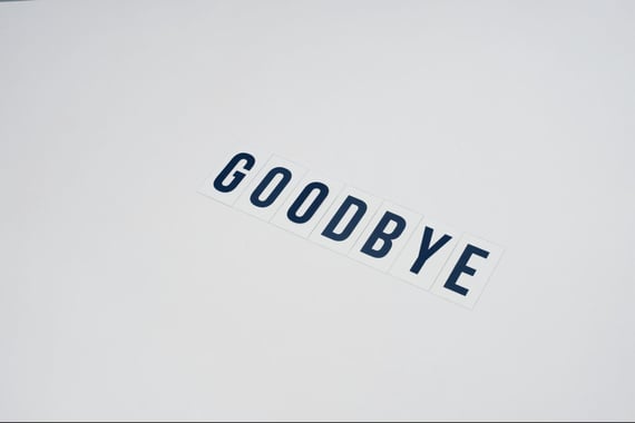 Goodbye handwritten against white background