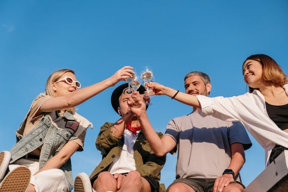People celebrating employee appreciation outside in spring