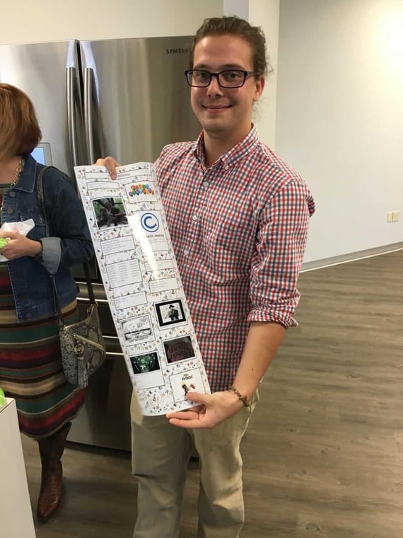 Man holding printed board
