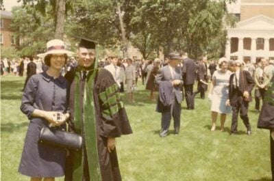 Vintage photo of two people at a graduation