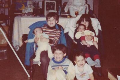 Family and children posing together in photo