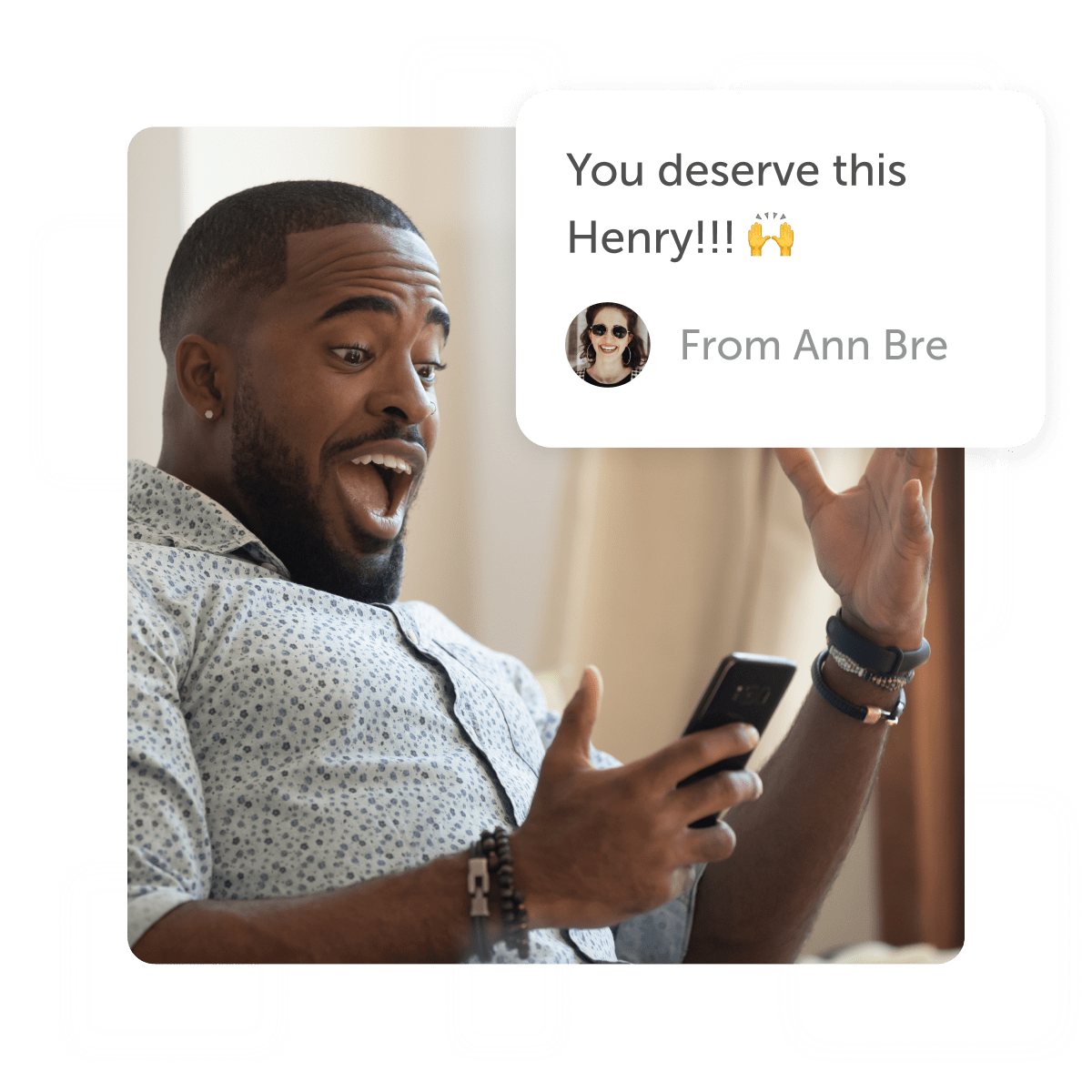 Excited man looking at phone with a