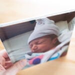Book printed with new baby Kudoboard photo on cover
