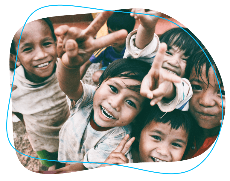 Group of smiling children making peace signs