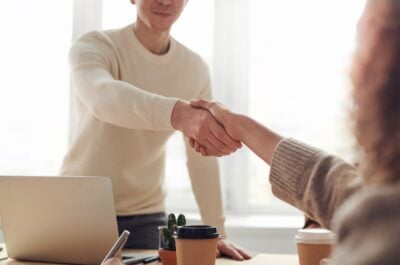 employee rewarded with handshake