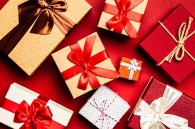 Gifts wrapped in red, white, and gold