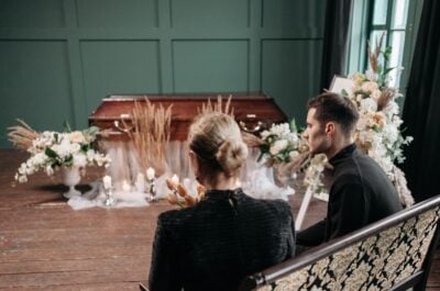 People sitting together at funeral service