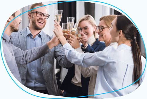 Group of employees toasting with champagne glasses