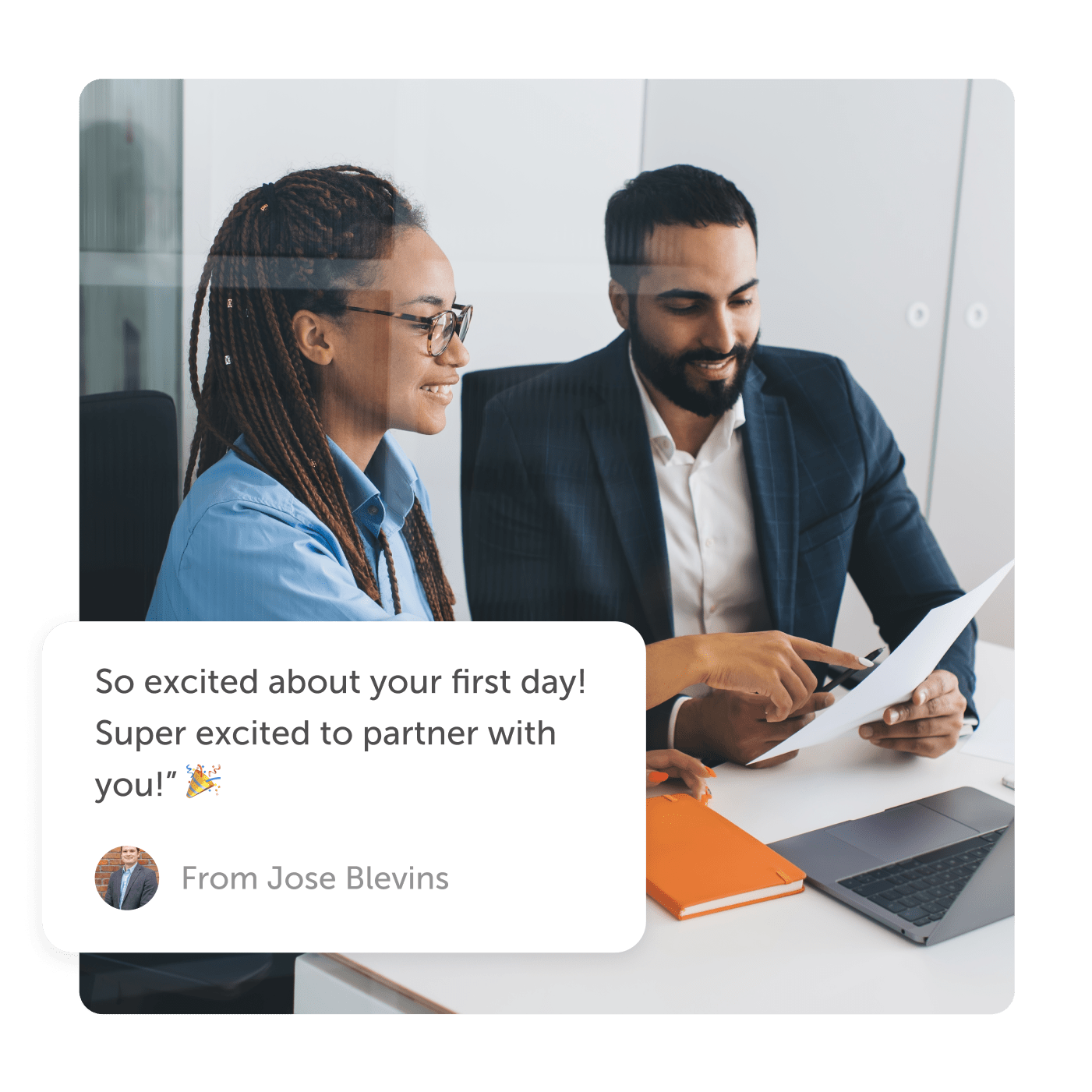 Employees looking at a document with an