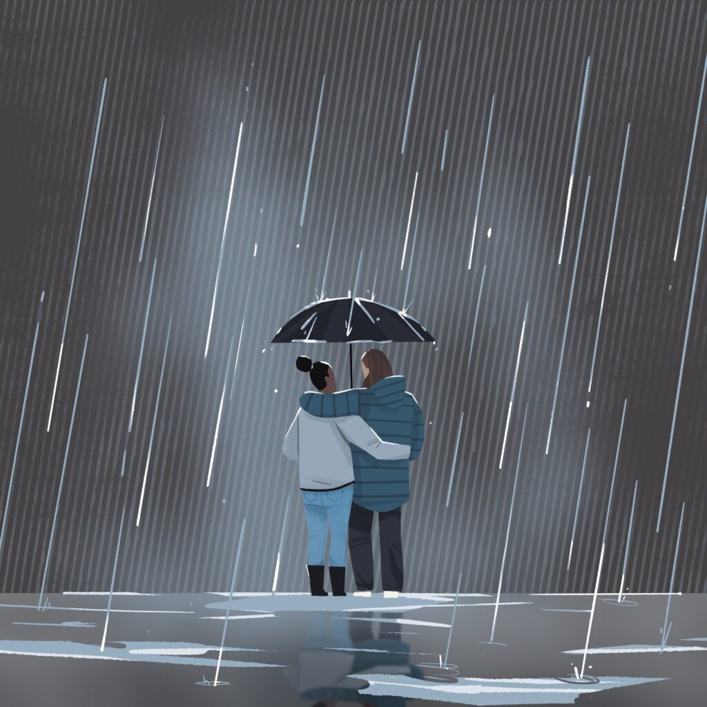 People hugging under umbrella in rain