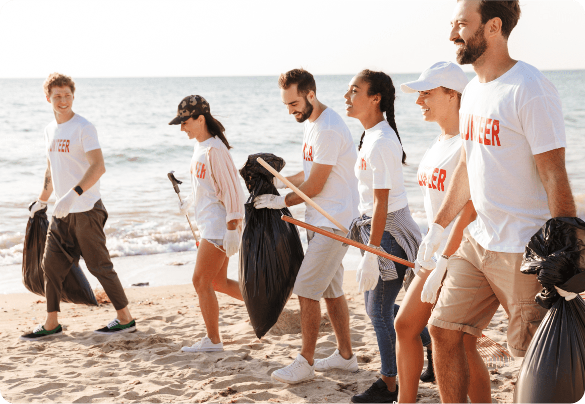 Volunteers collecting trash on beach