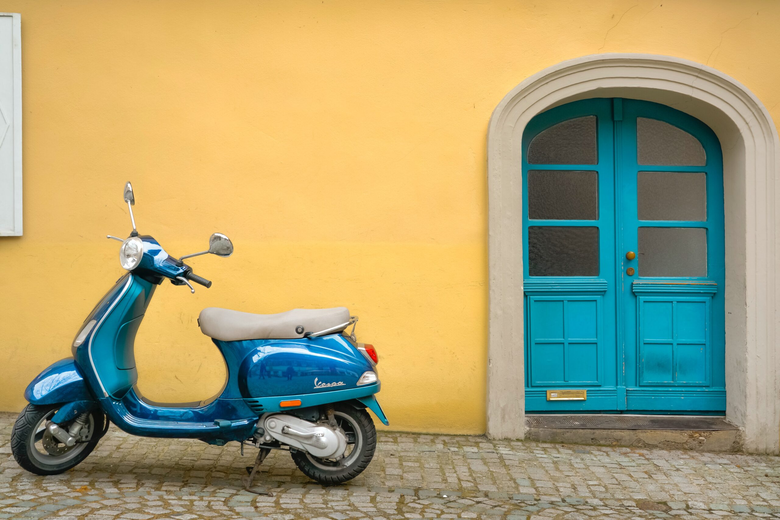 Scooter in front of building