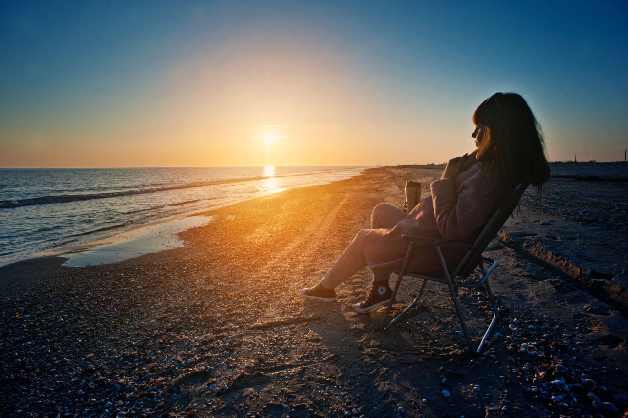 Person sitting on beach