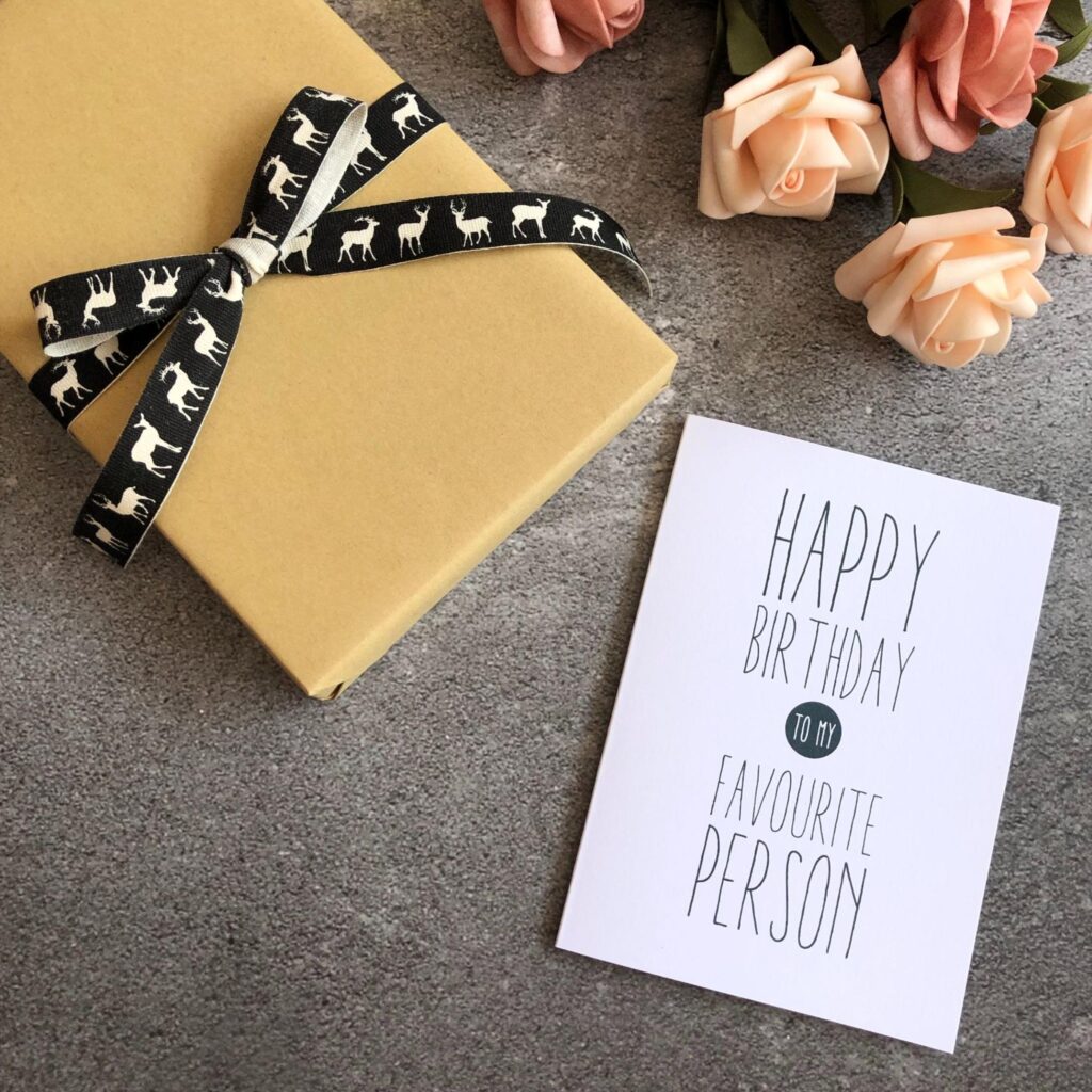 Happy birthday card with gift wrapped box
