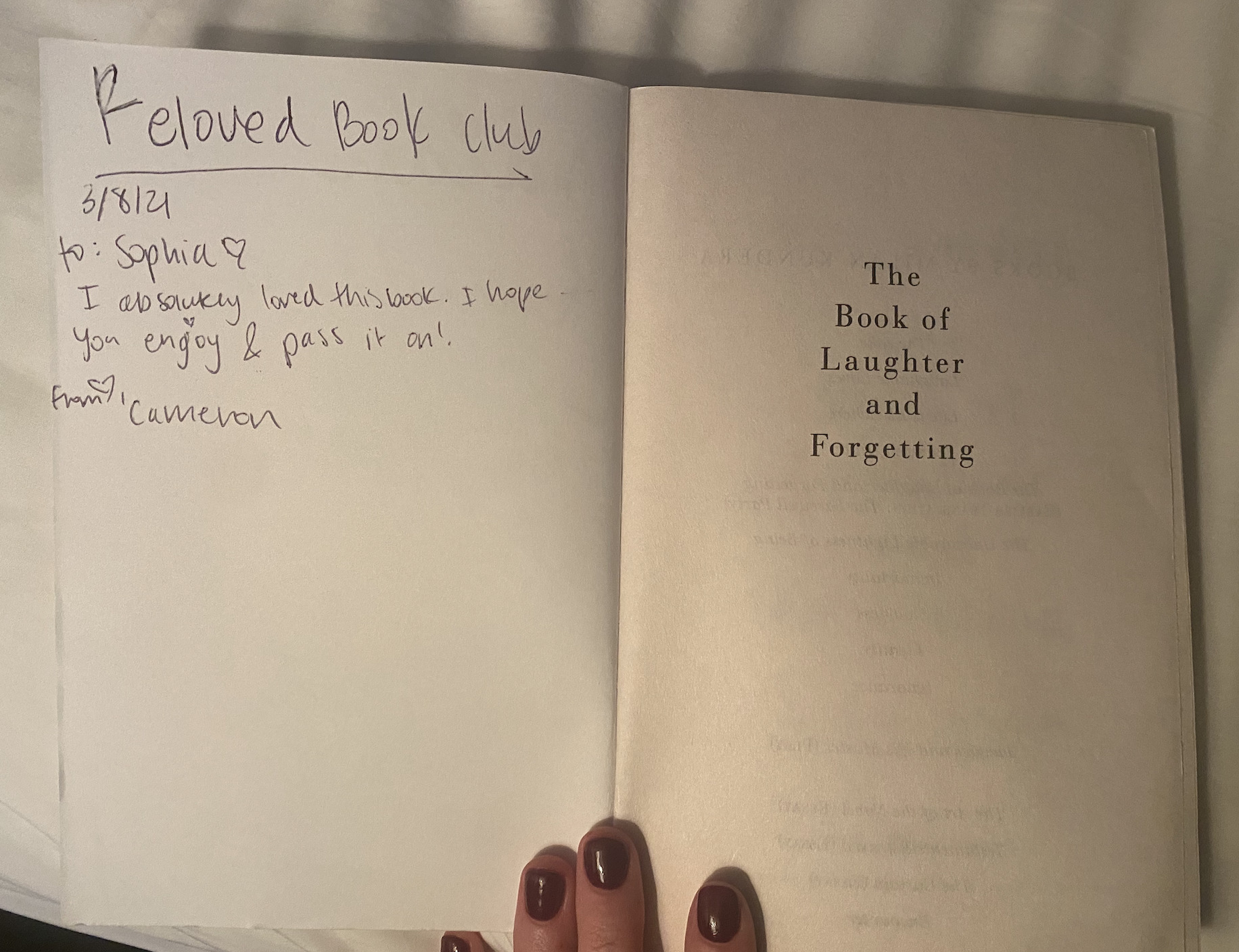 Book with handwritten note on inside cover