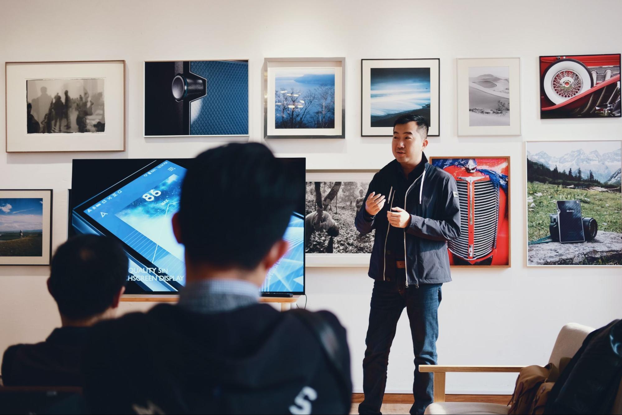 Man speaking in front of class