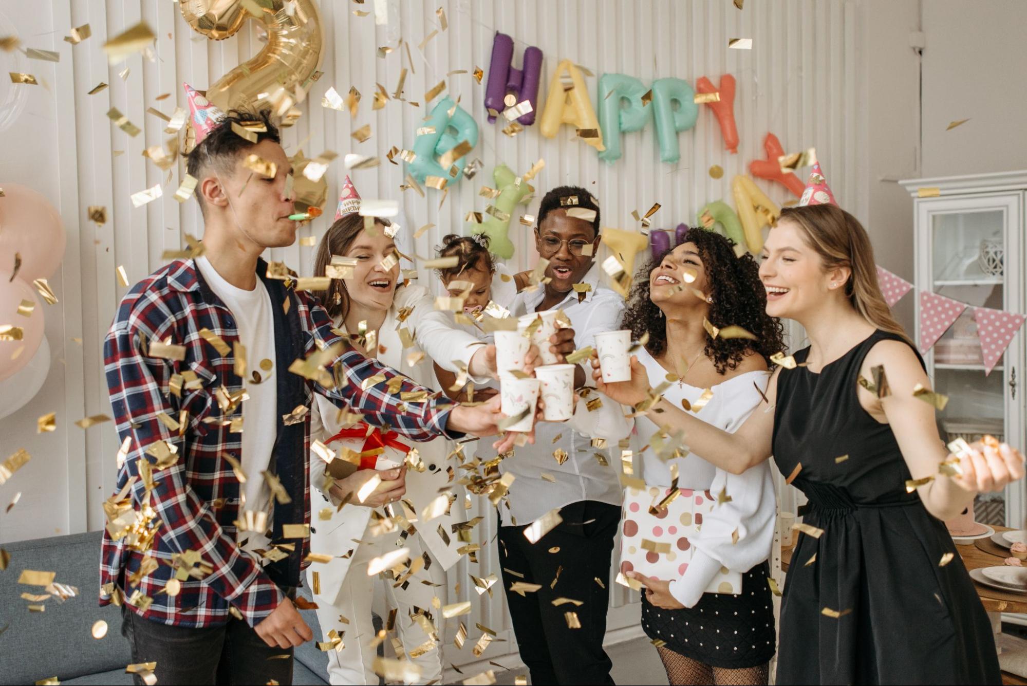 People celebrating a birthday in the office