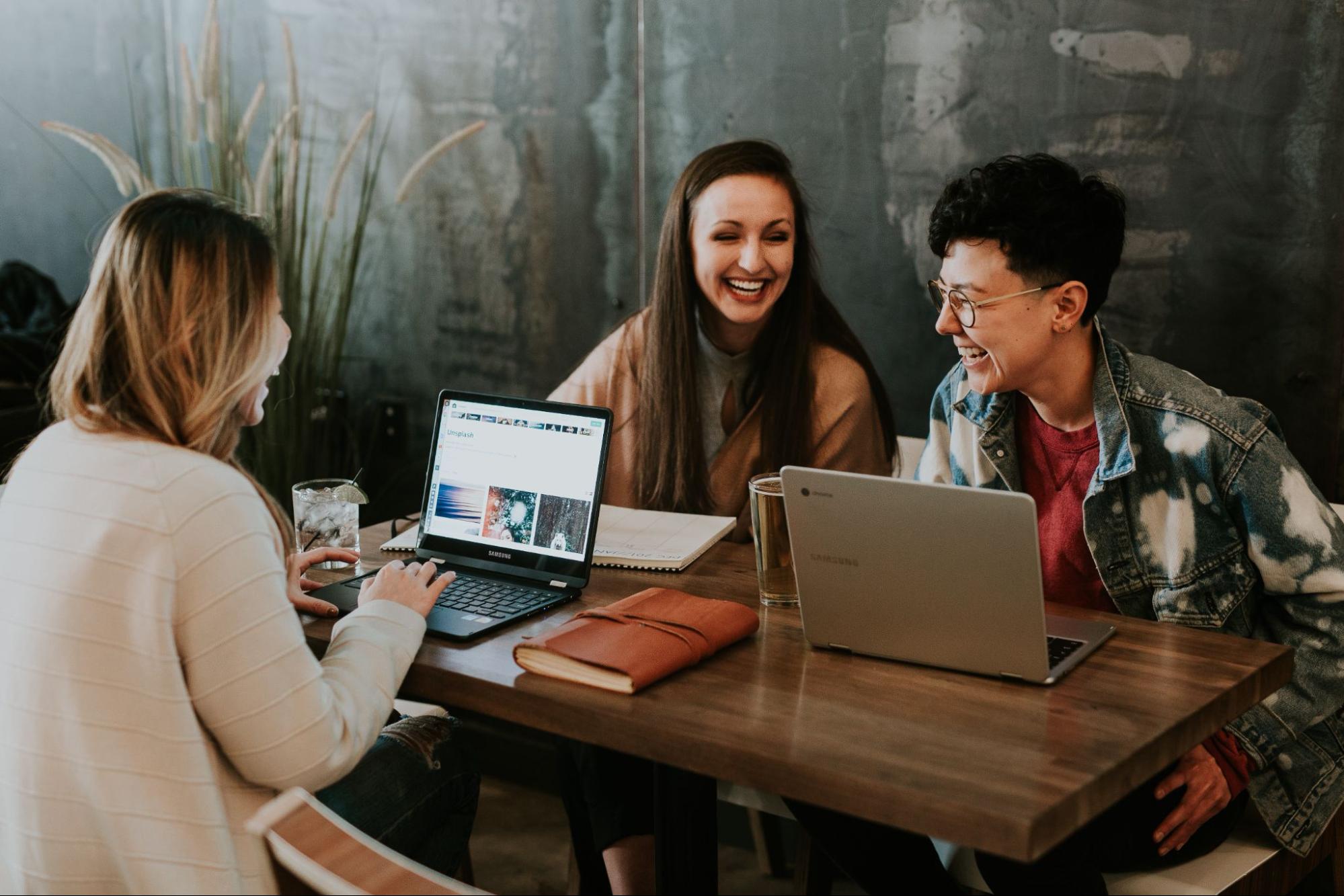 Coworkers sitting around office table