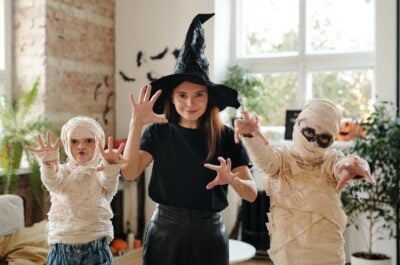 Woman and kids dressed in Halloween costume