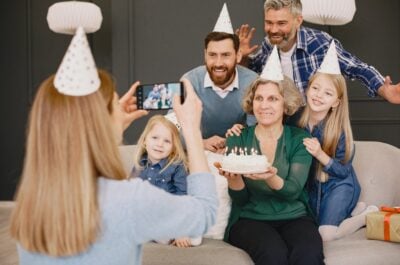 Family posing for birthday photo