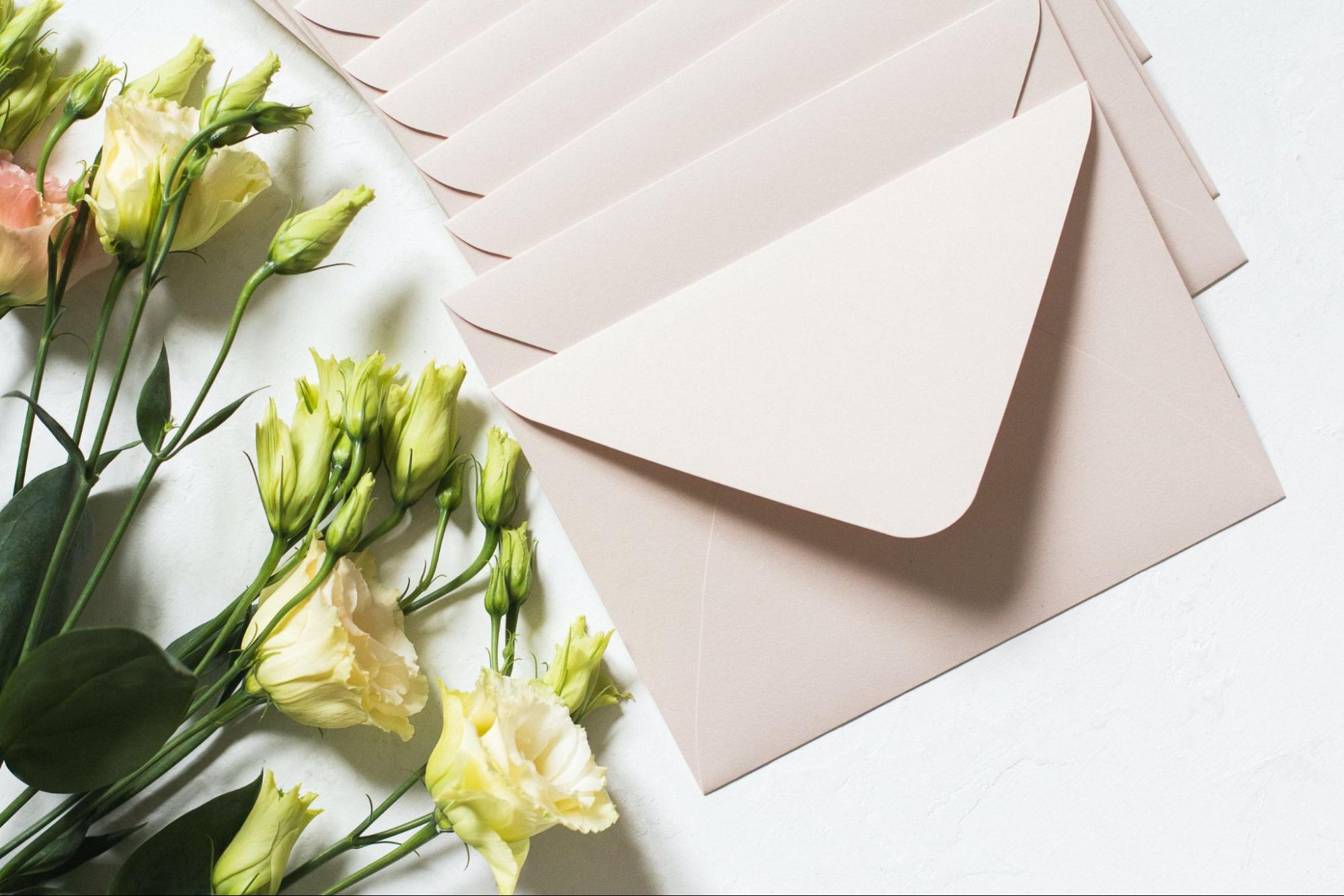 Set of envelopes with florals on white background