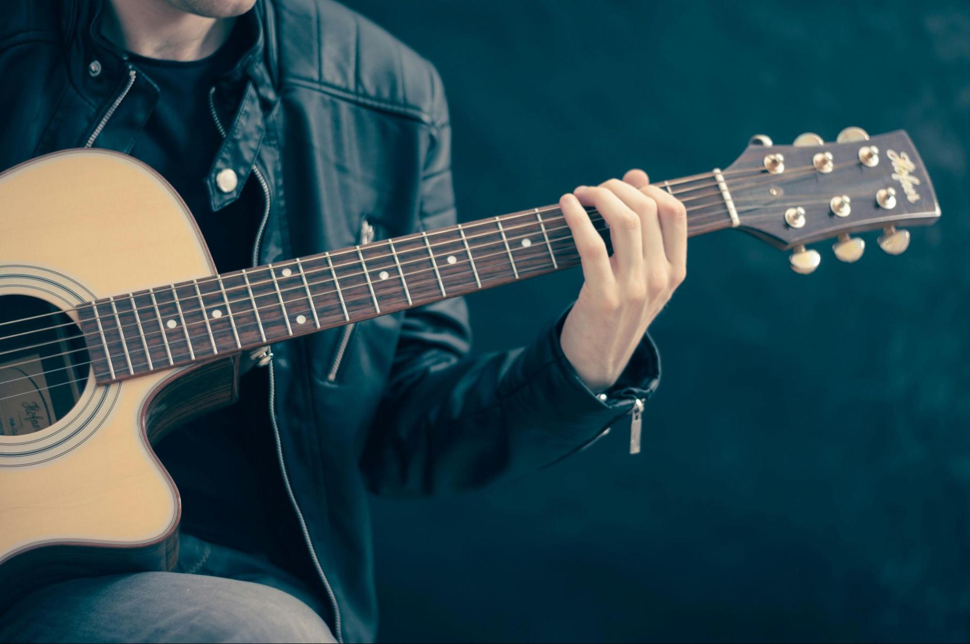 Man playing acoustic guitar