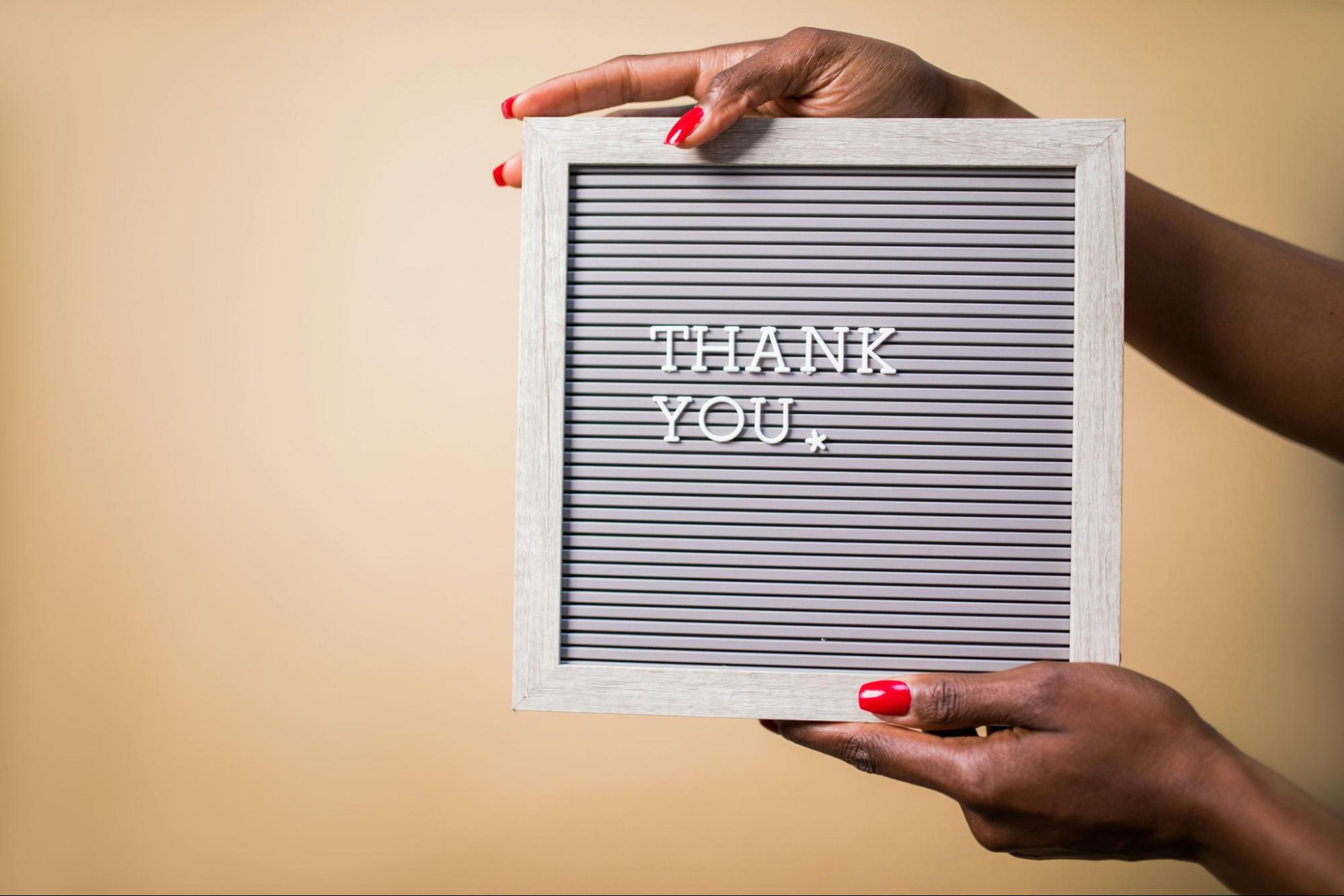 Thank you written on a board in blocks