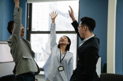 Employees celebrating and recognizing in the office