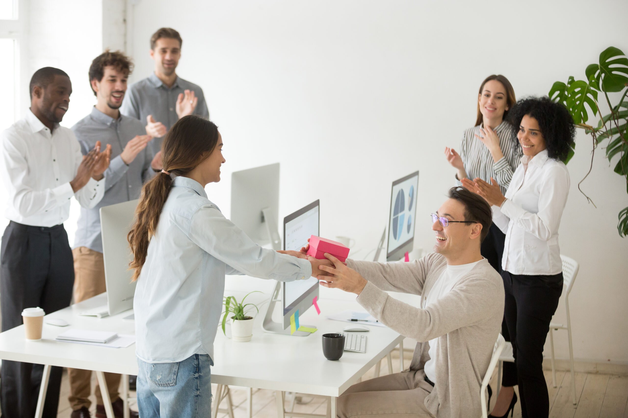 Employee receiving gift on their workiversary