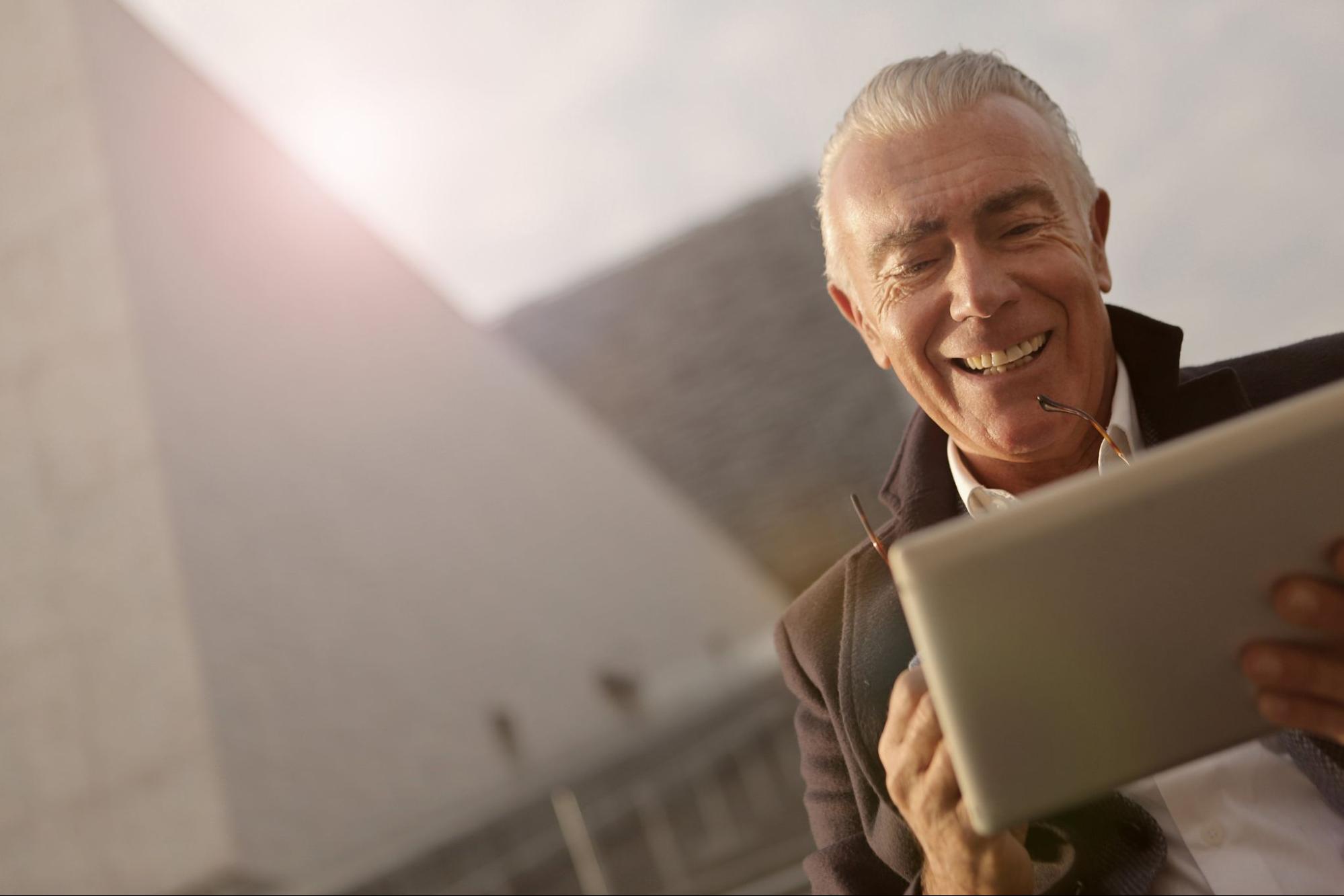 Boos looking at work anniversary messages on laptop