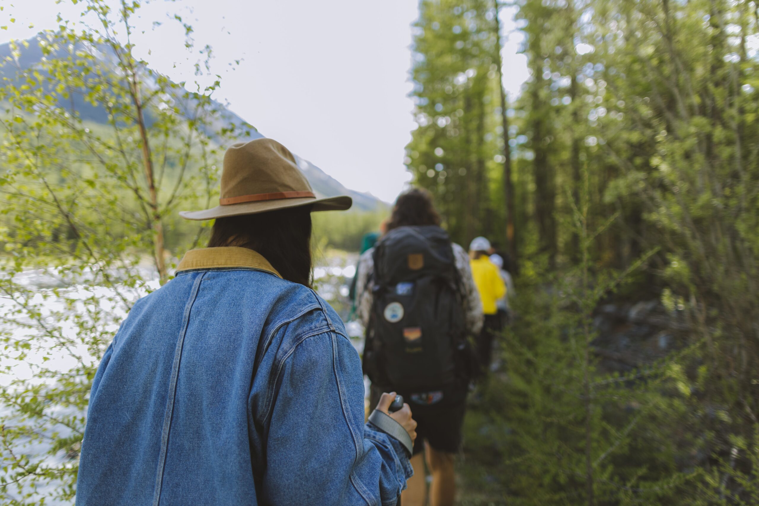 Employees hiking together during employee appreciation day event in spring