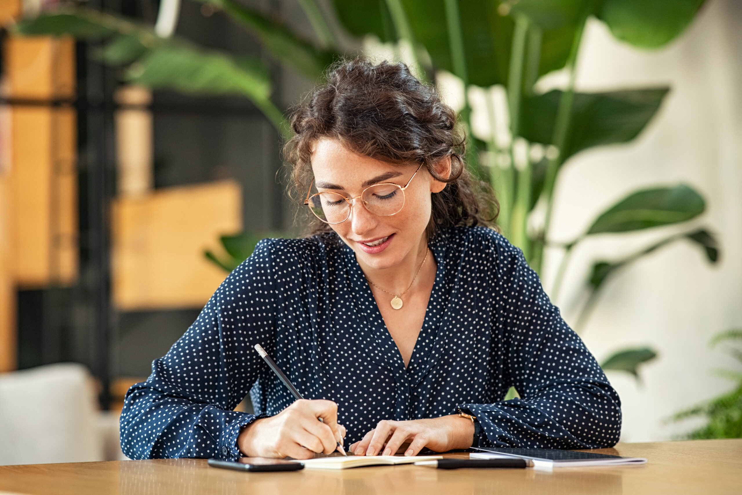 Person writing on stationary