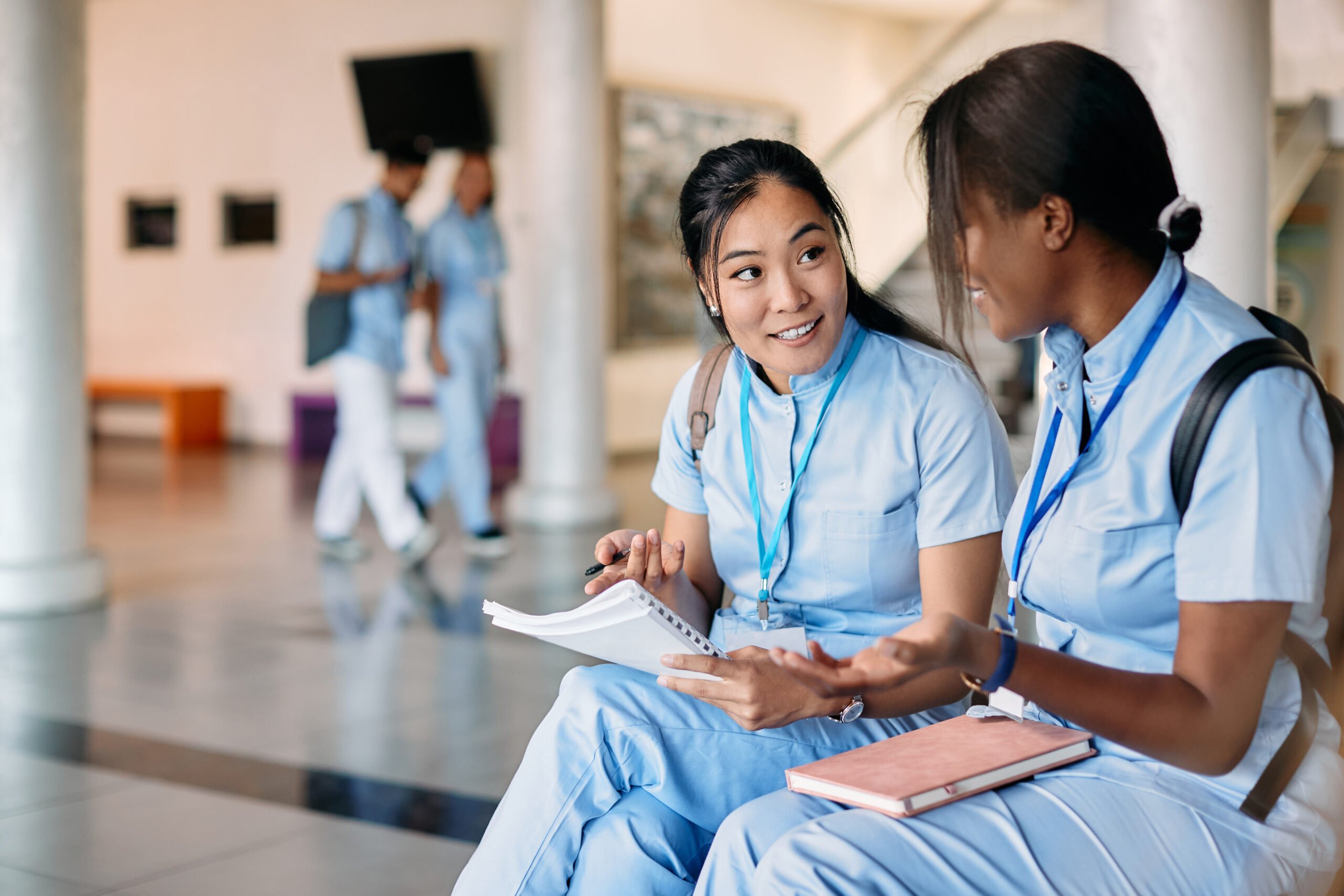 Two doctors sitting a professional development course