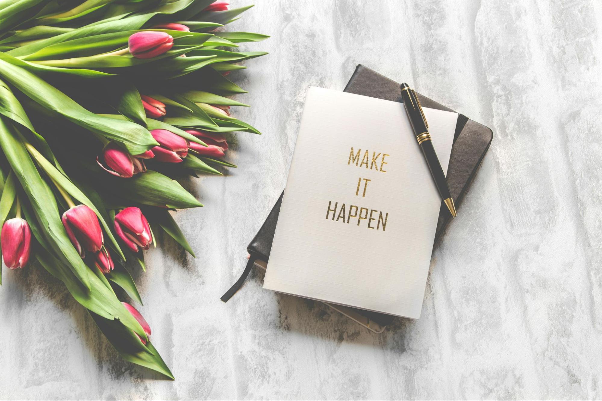 group card on desk with tulips