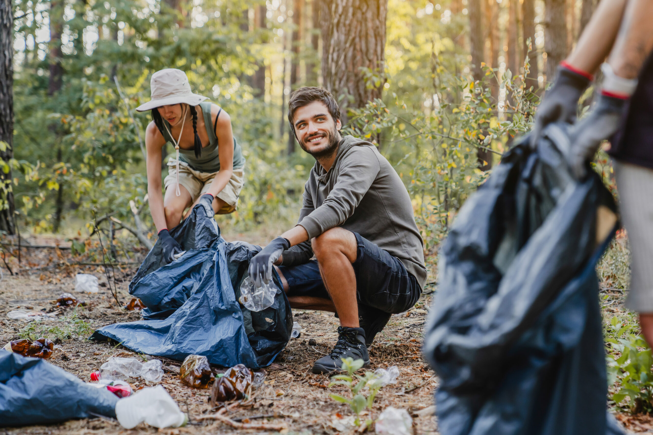 Group of volunteers picking up trash on Earth Day