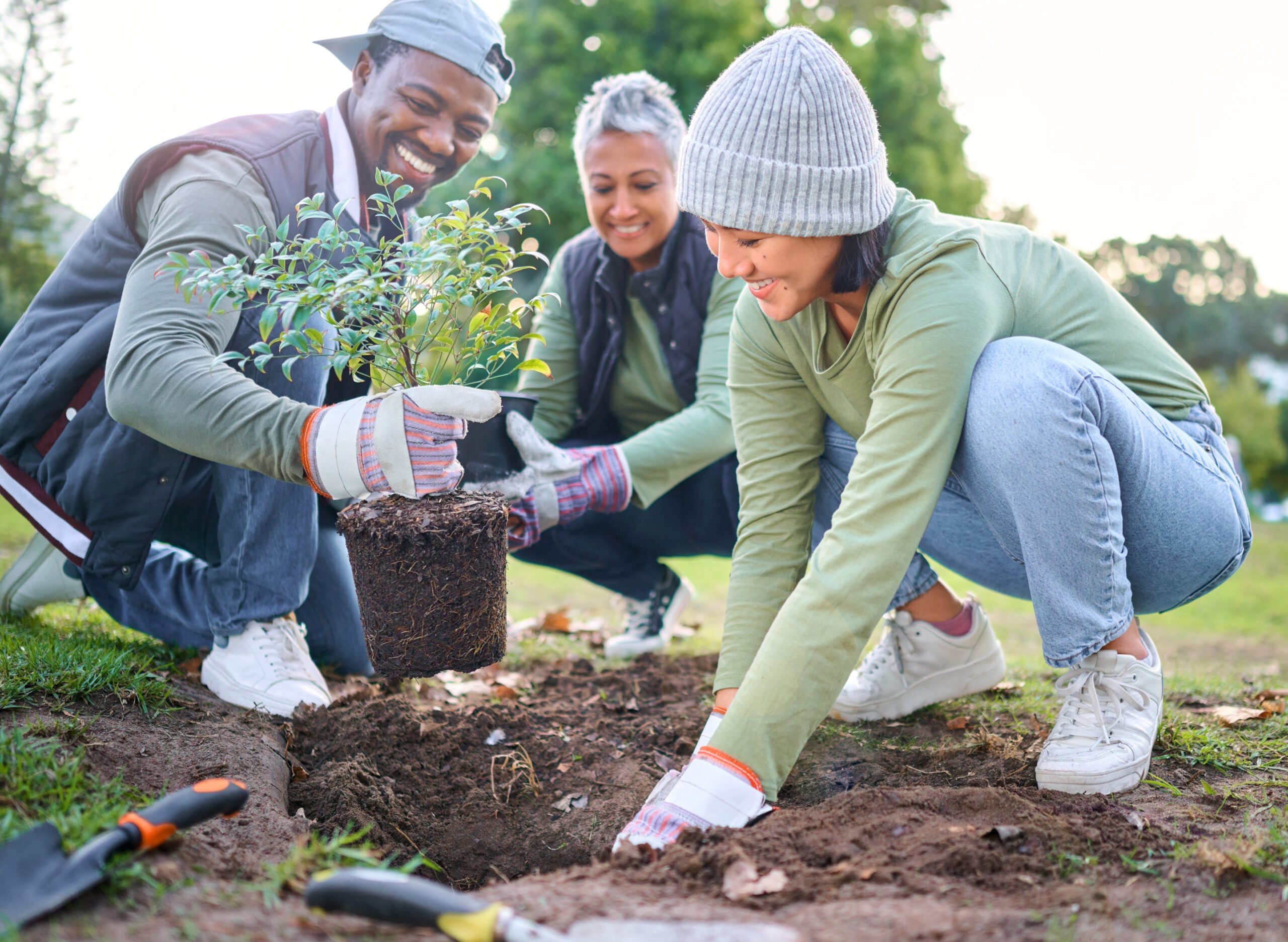 People planting a tree on Earth day