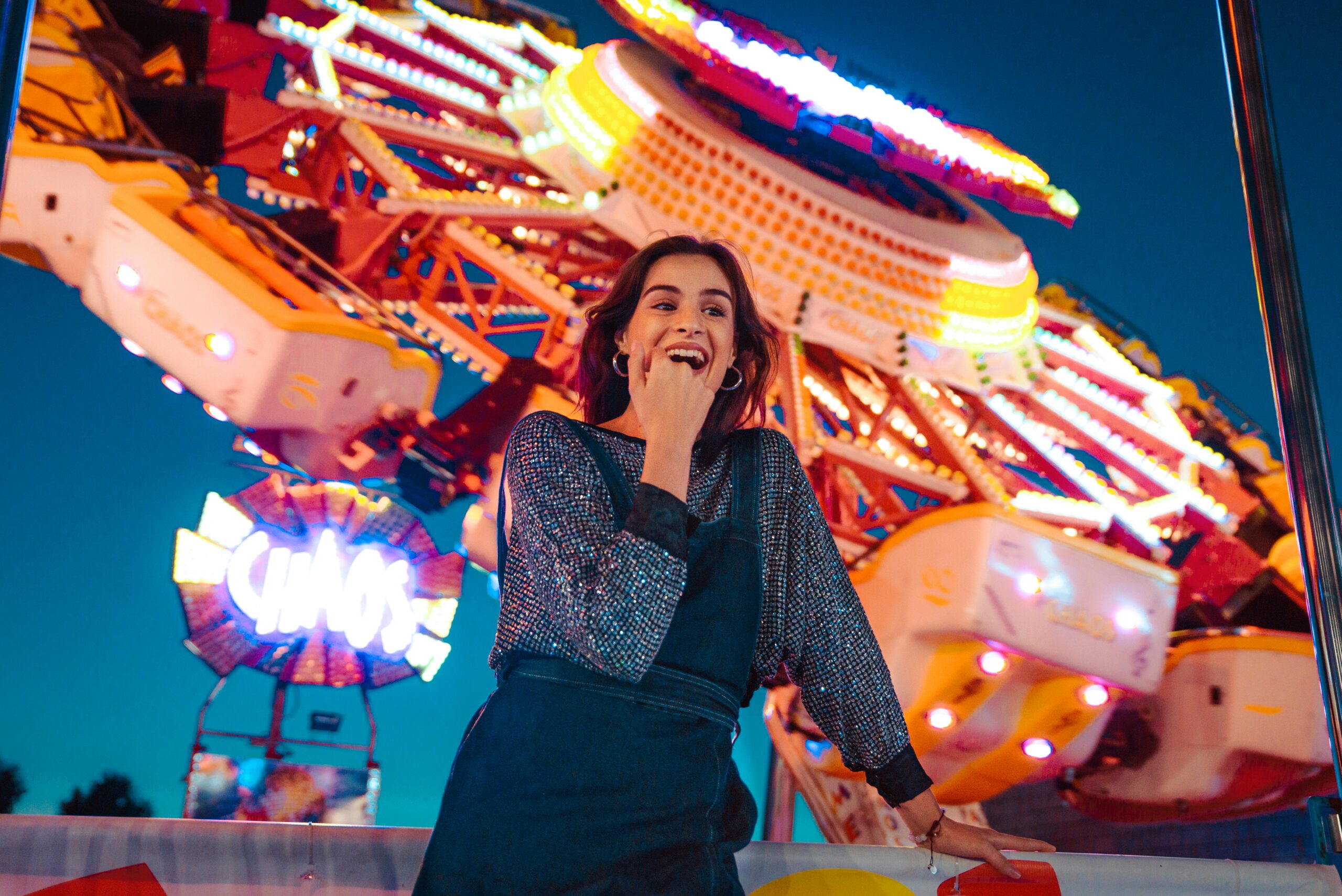 Woman at theme park during the night