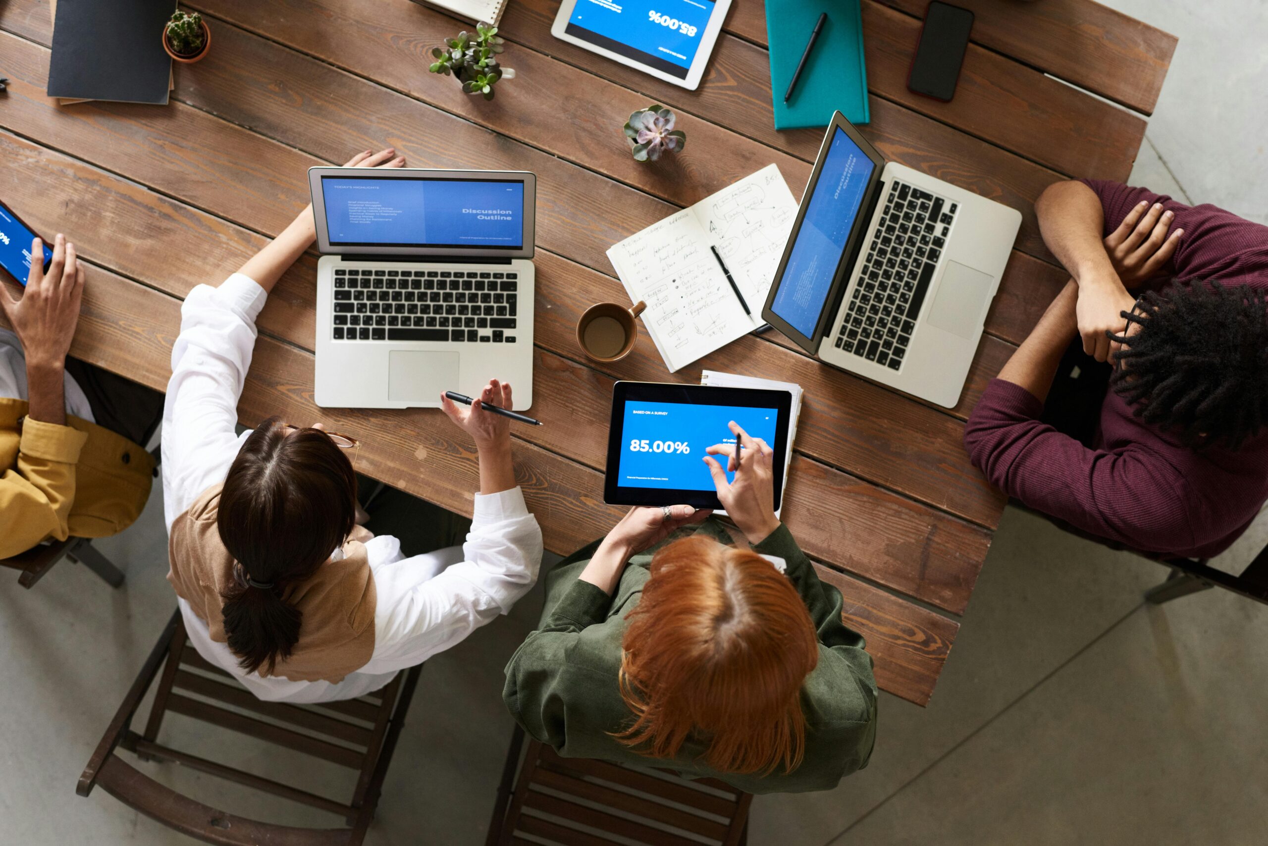 Employees working together on computers