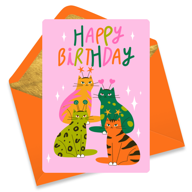 Whimsical birthday eCard featuring four colorful cartoon cats wearing party headbands on a pink background, with sparkles and playful “Happy Birthday” text in bright, multicolored letters.