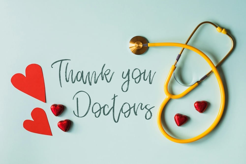 An ecard for a healthcare worker displays hearts, a stethoscope, and the words 