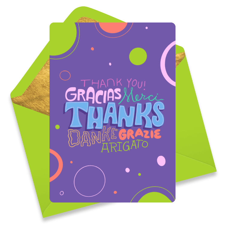 Multilingual thank you card in purple featuring the words 'Thank You', 'Gracias', 'Merci', 'Danke', 'Grazie', and 'Arigato', decorated with colorful circles and dots, with a green envelope behind it.