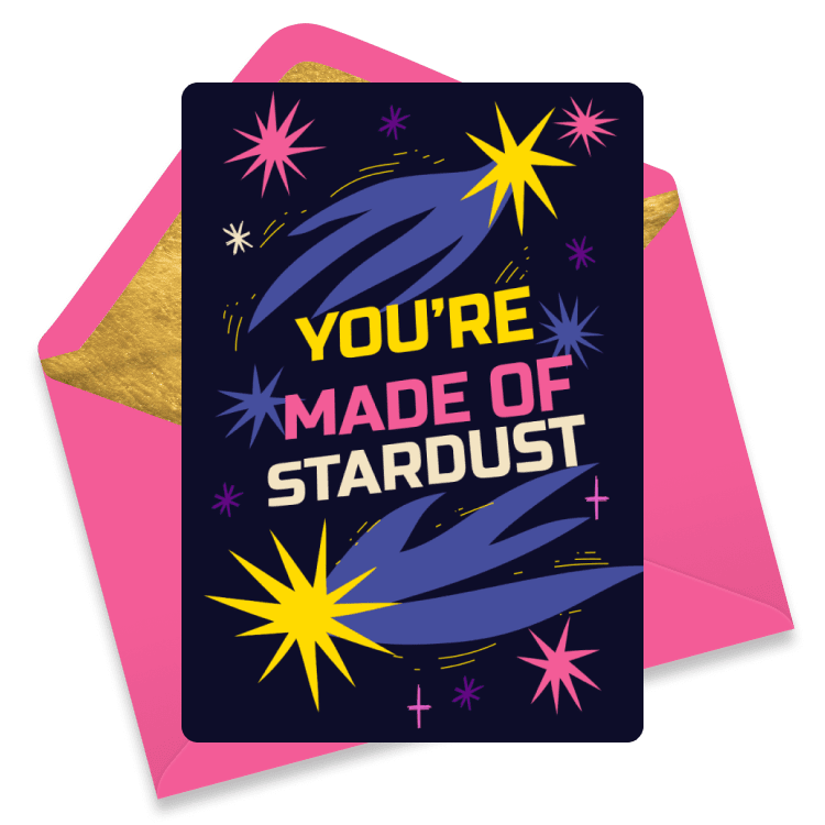 Bold cosmic congratulations eCard reading “YOU’RE MADE OF STARDUST” with bright comets and stars on a dark night sky.
