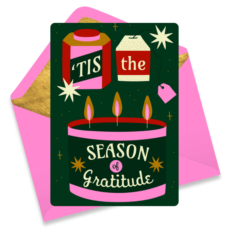 Christmas eCard with candle, tea bag, and the words 'Tis the Season of Gratitude'. Dark green background with pink accents and envelope.