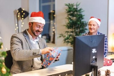 Coworkers with holiday gifts