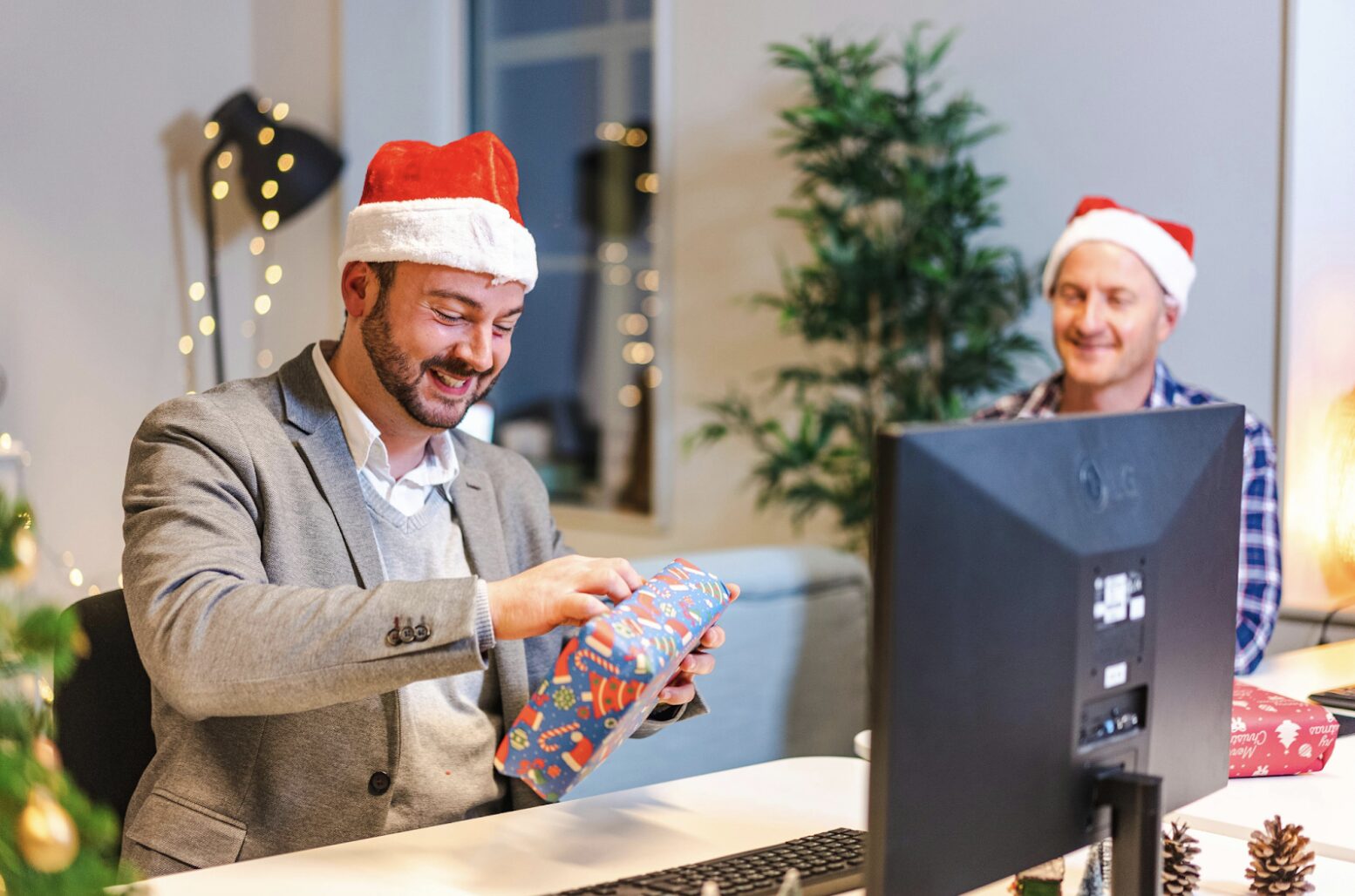 Coworkers with holiday gifts